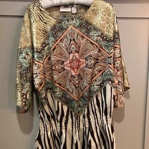 Lady’s top,Chico’s size 2